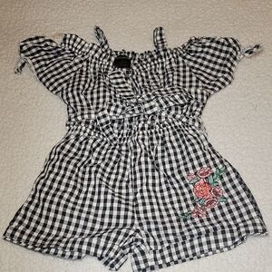Charming Black and White Checkered Romper with Floral Detail